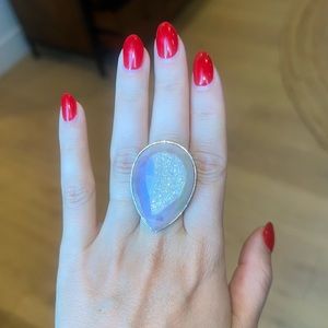 Gorgeous silver ring with huge pink druzy stone. Adjustable size